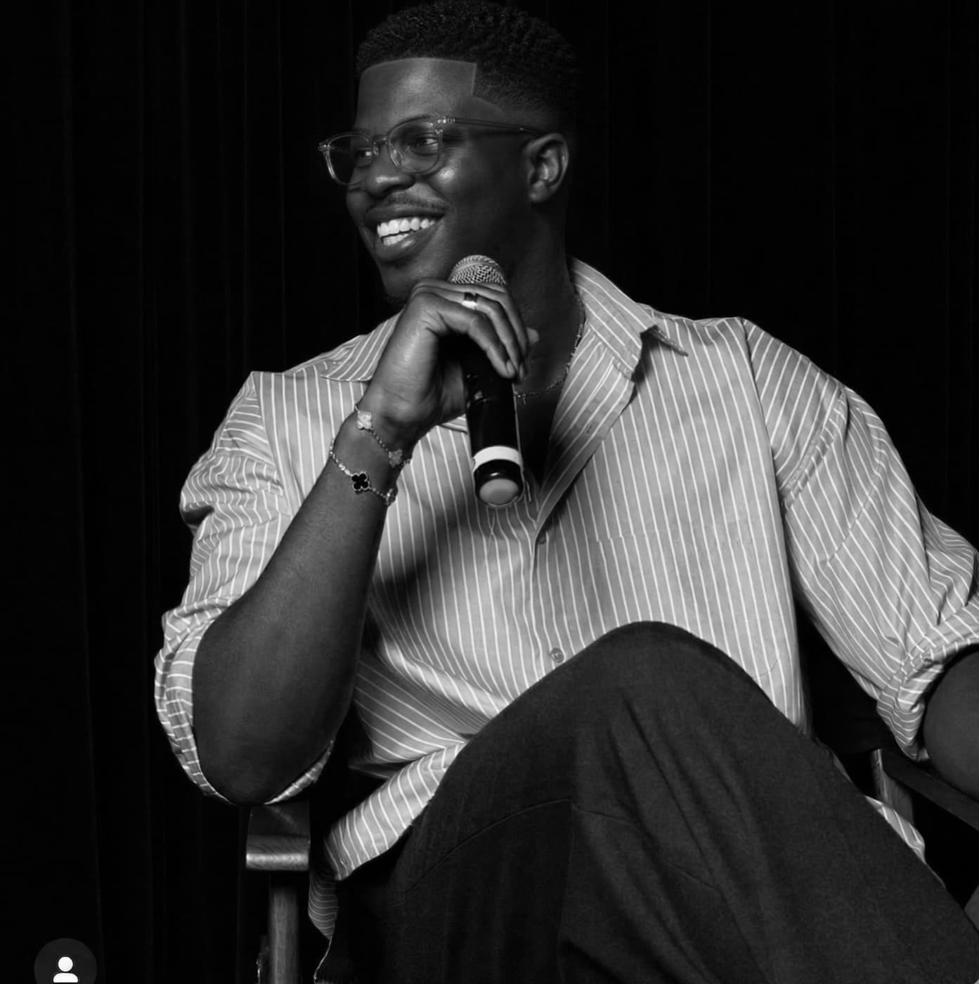 Tobi Ojet speaking on stage
